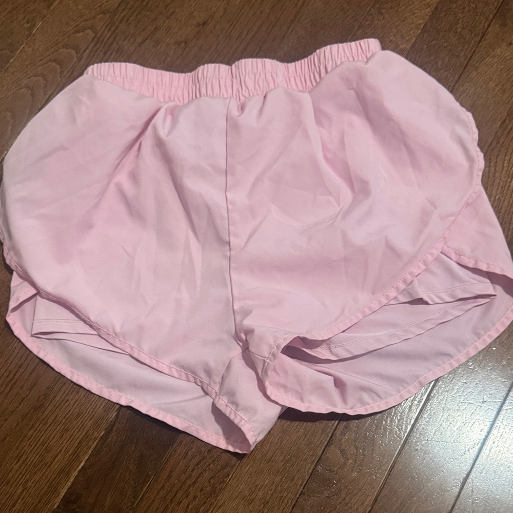 women pink sport shorts